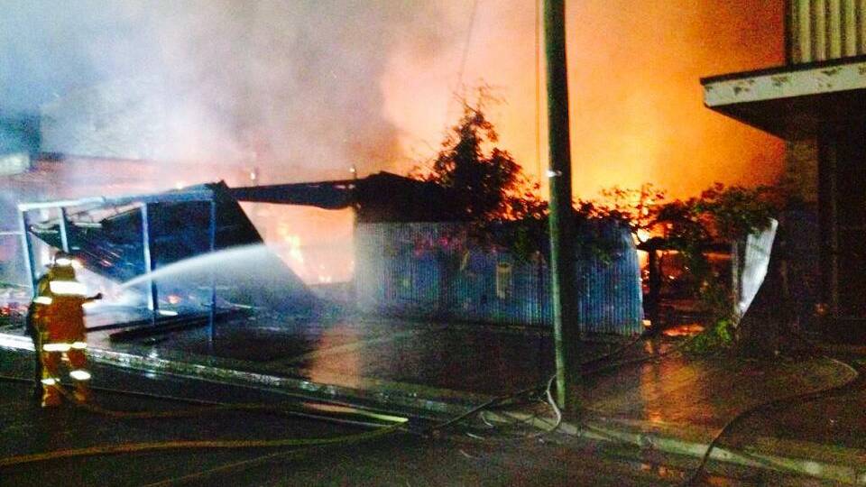 Firefighters battle a blaze in Brewarrina's main street. Photo contributed.