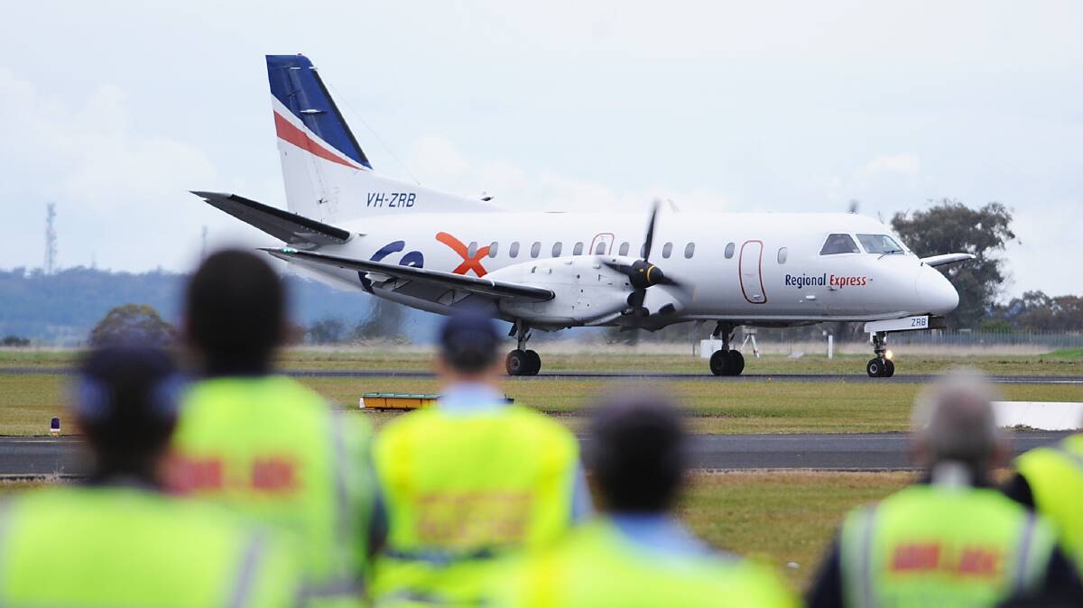 A Sydney-bound passenger plane landed safely after being forced to turn back to Dubbo airport. Photos: BELINDA SOOLE