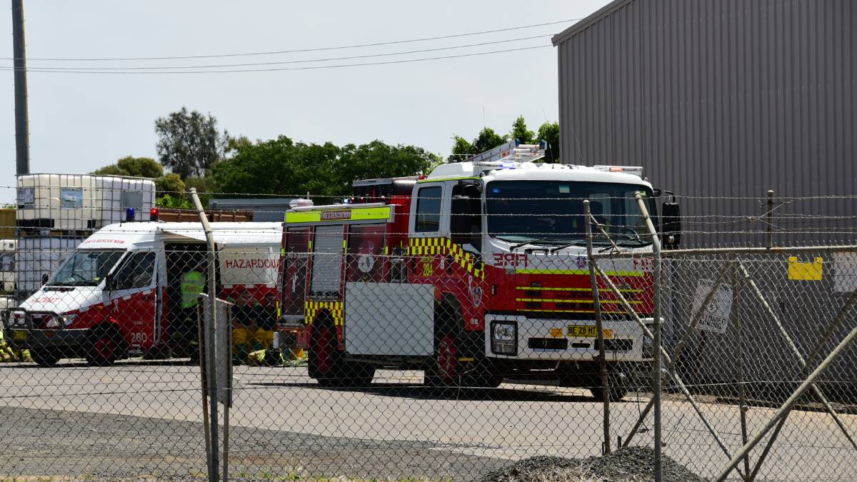 FIREFIGHTERS converged on a Dubbo storage and distribution warehouse following reports of a chemical spill on Wednesday morning. Photo: BELINDA SOOLE