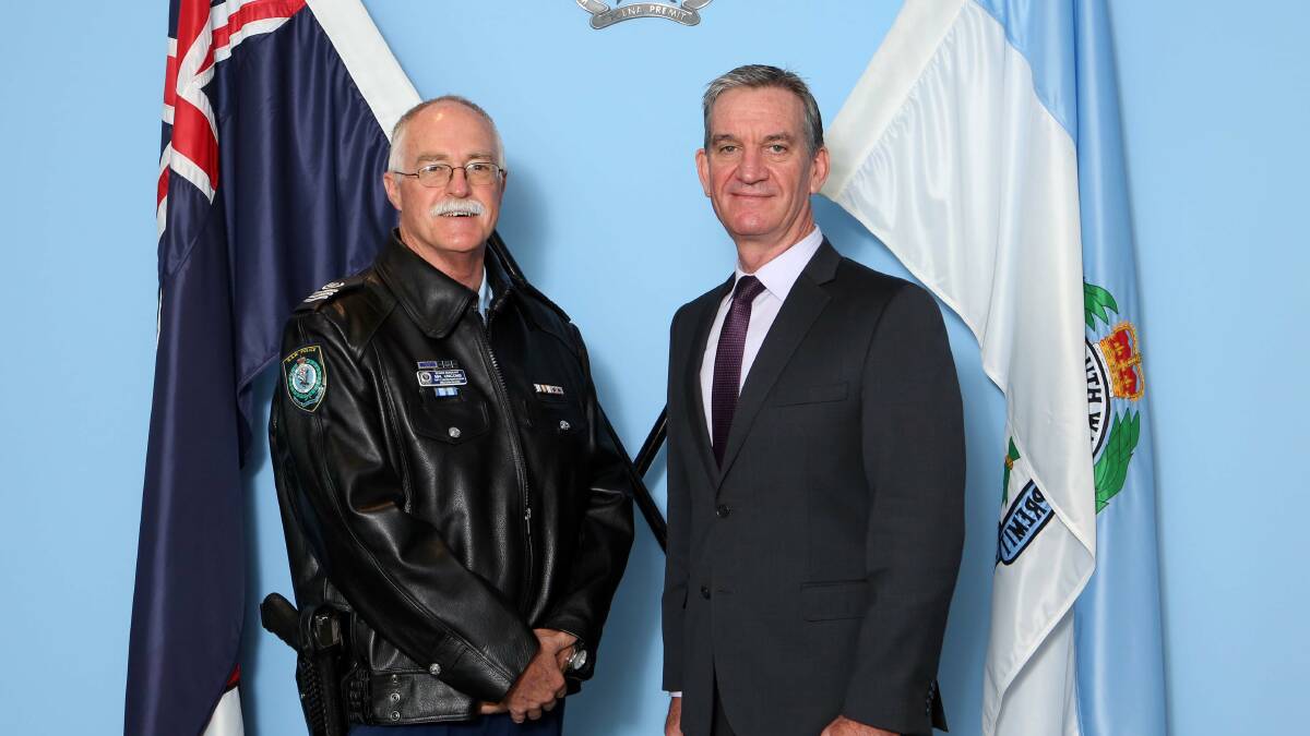 Senior Sergeant Mal Unicomb has been awarded an Australian Police Medal. He is pictured with NSW Police Commissioner Andrew Scipione. Photo: NSW POLICE.