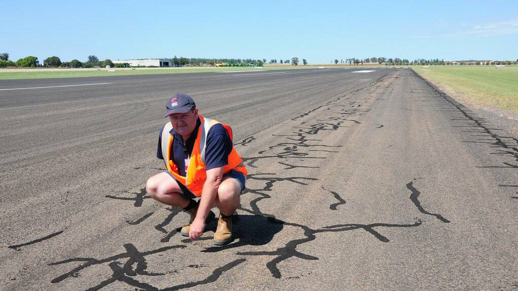 Dubbo City Regional Airport operations manager Lindsay Mason on the runway that will undergo resurfacing later this month. Photo: HANNAH SOOLE
