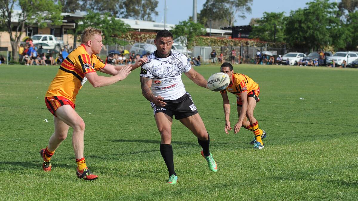 Nathan Merritt, pictured in action during Sunday's play, will line up in Monday's grand final after his Redfern All Blacks side defeated Newcastle Yowies in the semis. Photo: KATHRYN O'SULLIVAN