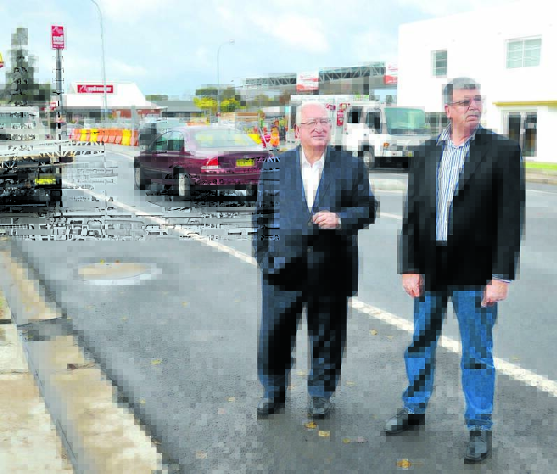 PULLING OUT ALL STOPS: Mayor John Davis and councillor Glenn Taylor on Bathurst Road near the Glenroi Avenue intersection. They are demanding traffic lights for the intersection.