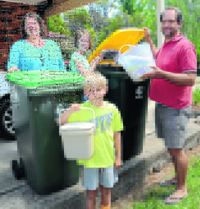 NOT A WASTE: Emma, Siri, (front) Jack and Craig Flemming participated in Orange City Council’s fortnightly red bin waste trial. Photo: JUDE KEOGH  
