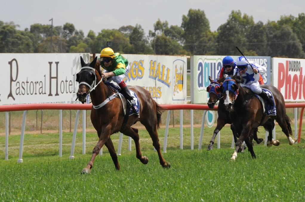 Aaron Sweeney riding Little Bitty to victory at Dubbo Turf Club on Tuesday.                       