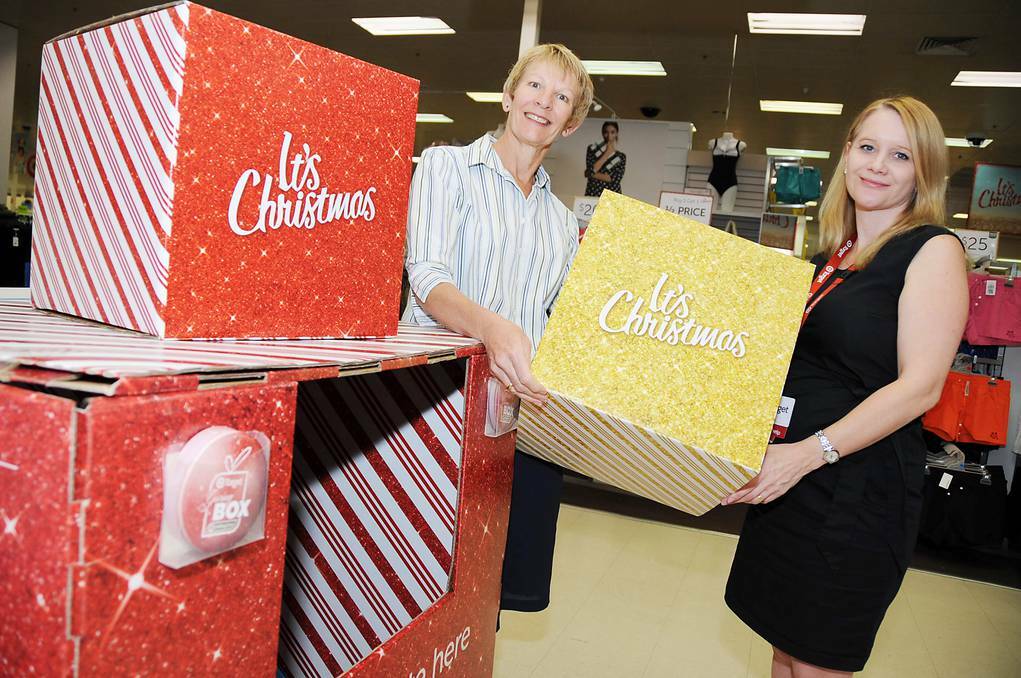 UnitingCare Dubbo coordinator Jacqui Tooth and Target Dubbo store manager Cherie Fuller are encouraging everyone to get behind the 2014 Giving Box. Photo: BELINDA SOOLE