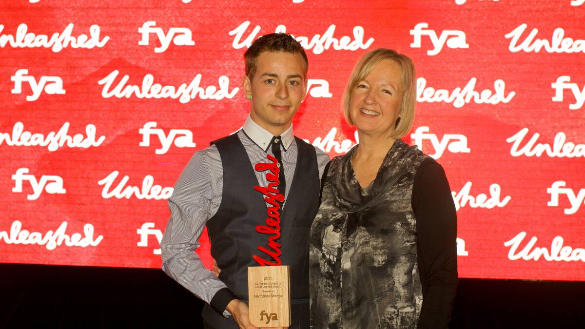 Dubbo’s Nicholas Steepe accepts his Unleashed trophy from the Foundation for Young Australians’ chief executive officer Jan Owen AM.				             Photo: CONTRIBUTED