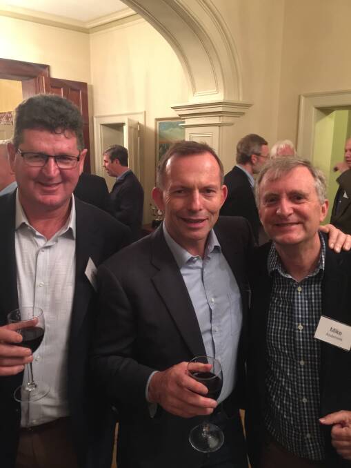 Geoff McKay (left), Tony Abbott and Mike Anderson at the 40th anniversary reunion of the St Ignatius College class of 1975. Photo: SUPPLIED