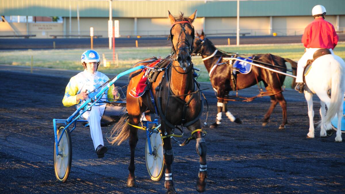 Nathan Carroll on Full Disclosure after winning the first event at the Dubbo Paceway on Friday night. 								        Photo: JOSH HEARD