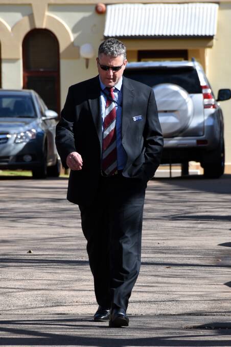 Detective Sergeant Scott Baker leaving Dubbo Local Court. Photo: BELINDA SOOLE