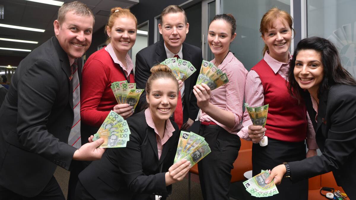 Westpac Dubbo team members Darren Mann, Jessica Weber, David Egan, Eliza Hogden, Penny Browning, Lisa Jones and (front) Jessica Hull call for applications from charities and not-for-profit groups for a $500 donation. Photo: BELINDA SOOLE