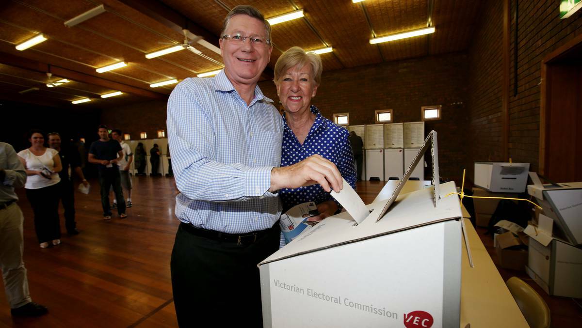 Premier Denis Napthine and wife Peggy submit their votes at a Port Fairy polling booth. Picture: LEANNE PICKETT