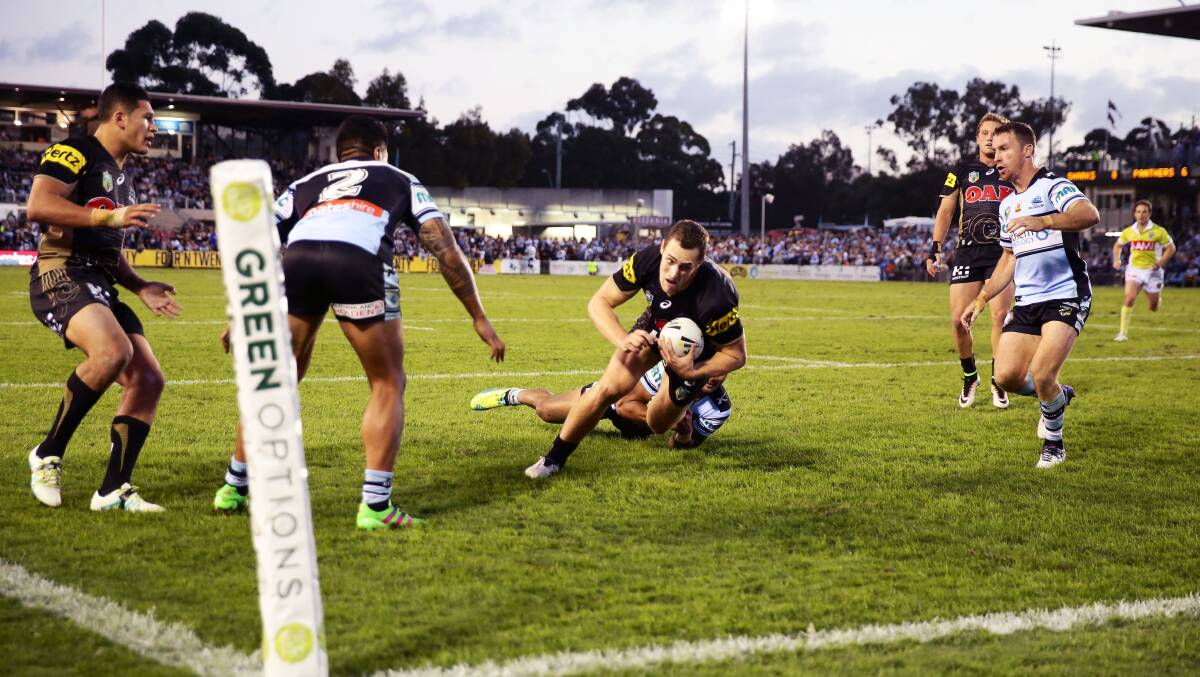 Isaah Yeo goes over for a try in Penrith's round eight clash against the Cronulla Sharks. The Dubbo junior will play on the wing for the VB Country Origin side in Sunday's City-Country fixture in Tamworth. Photo: GETTY IMAGES