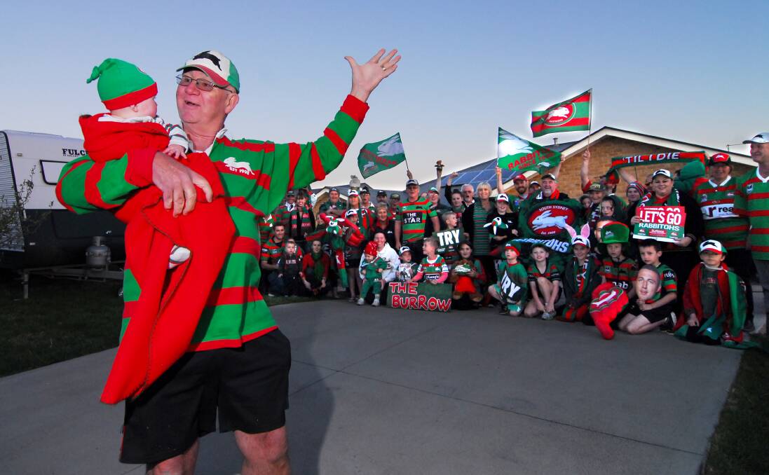 GO SOUTHS: Fanatical Rabbitoh fan Barney Rumble, front, and a band of local Souths fans gathered in Bathurst earlier this week ahead of tomorrow’s National Rugby League grand final. Photo: ZENIO LAPKA