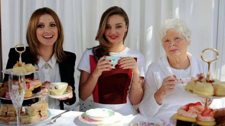 Family affair: Miranda Kerr, centre, and her grandmother Anna Kerr at high tea with Kate Waterhouse. Photo: Edwina Pickles