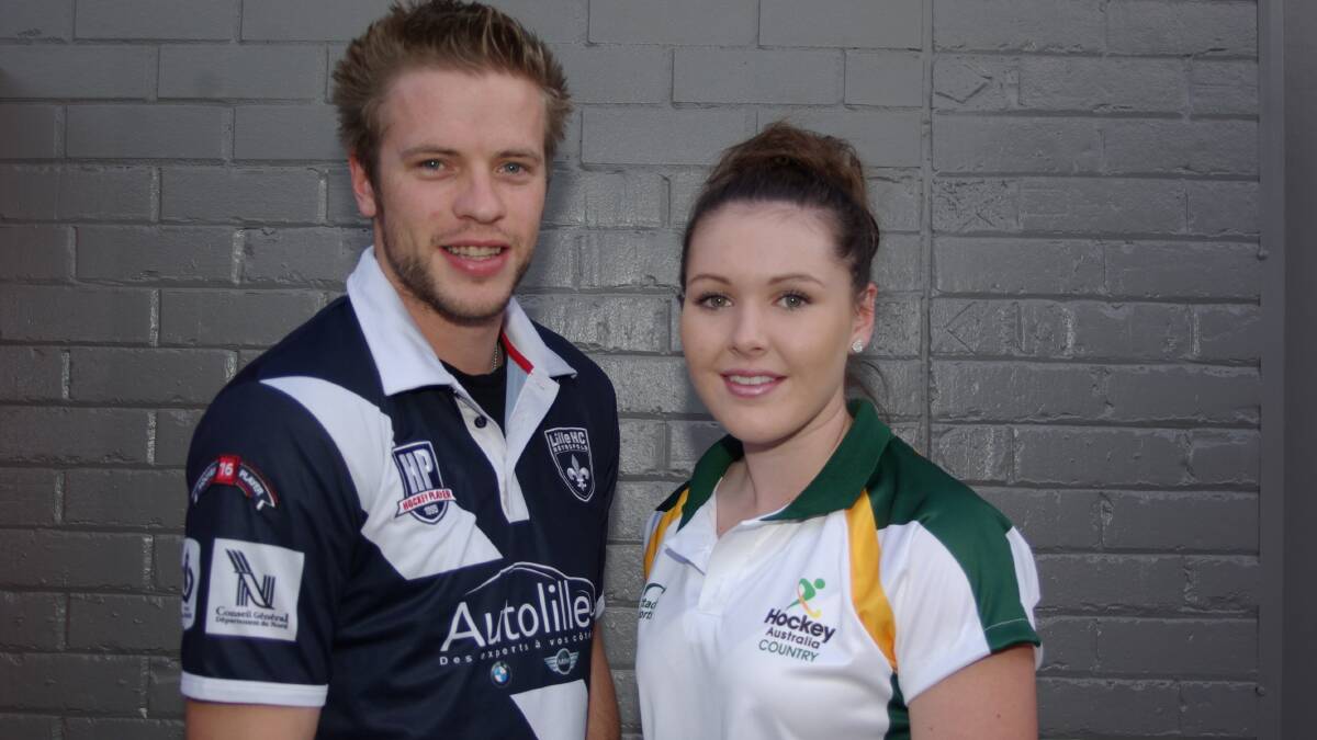 Dubbo hockey product Samuel Mould with Emma Corcoran, who will travel to Fiji in the coming weeks for the Oceana Pacific Cup. Photo: Jackie PRATTEN