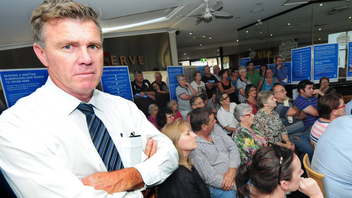 Concerned South Dubbo resident Steve Hodder was part of a large crowd on Tuesday that called for Dubbo City Council to reschedule a public meeting to allow more discussion about proposed zoning changes in their neighbourhood. Photo: LOUISE DONGES