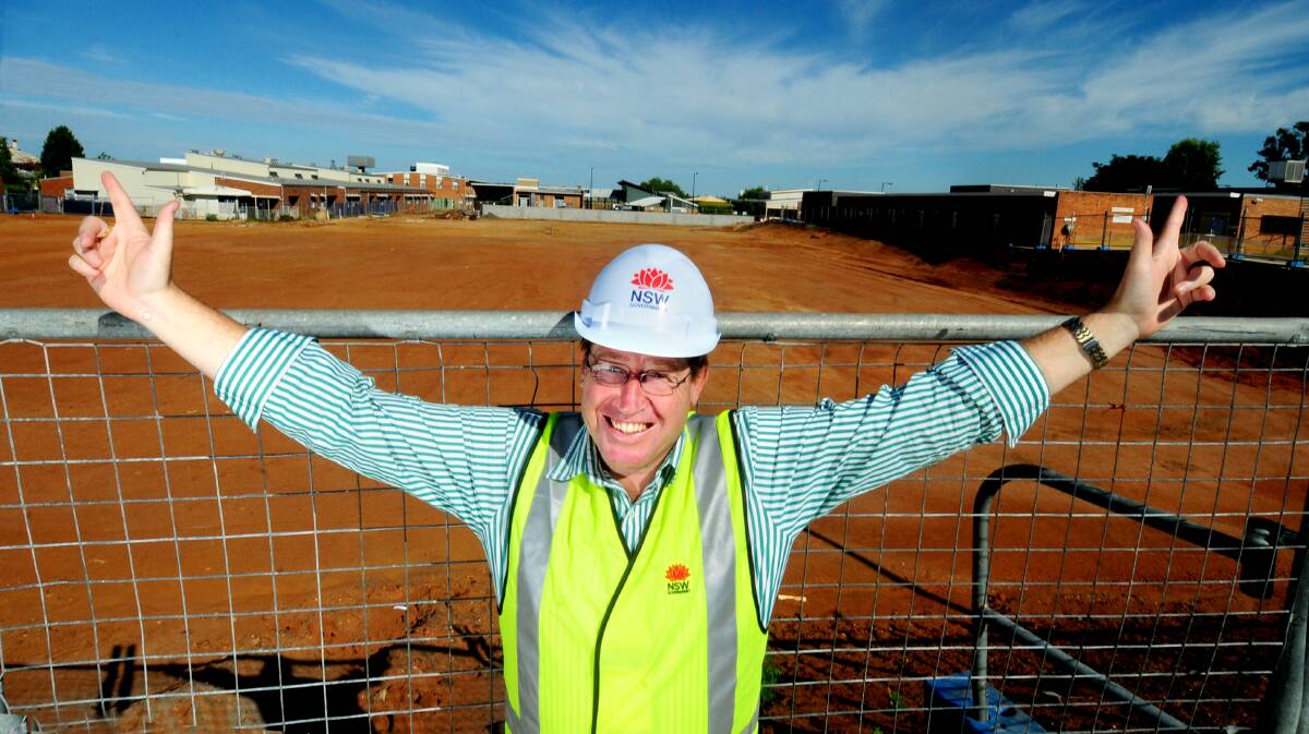 State Member for Dubbo Troy Grant celebrates the awarding of the contract for stage one and two redevelopment main works at Dubbo Hospital. 		                 Photo: LOUISE DONGES