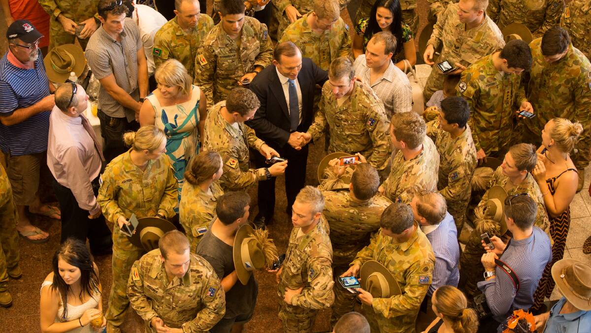 PM Tony Abbott at a reception at NT Parliament after Darwin lined the main street to welcome home local troops from Afghanistan. Photo: GLENN CAMPBELL