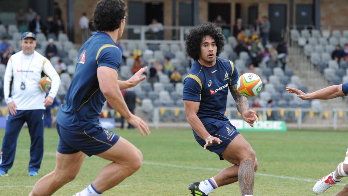 Joe Tomane goes through his paces at Wallabies training yesterday. 	Photos: LOUISE DONGES