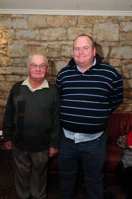 After 36 years delivering newspapers across Dubbo, John Monahan is finally calling it a day. Mr Monahan (left) is pictured with Michael Adams at a special send off dinner at the Milestone Hotel on Saturday night. Photo: JACKIE HUNT