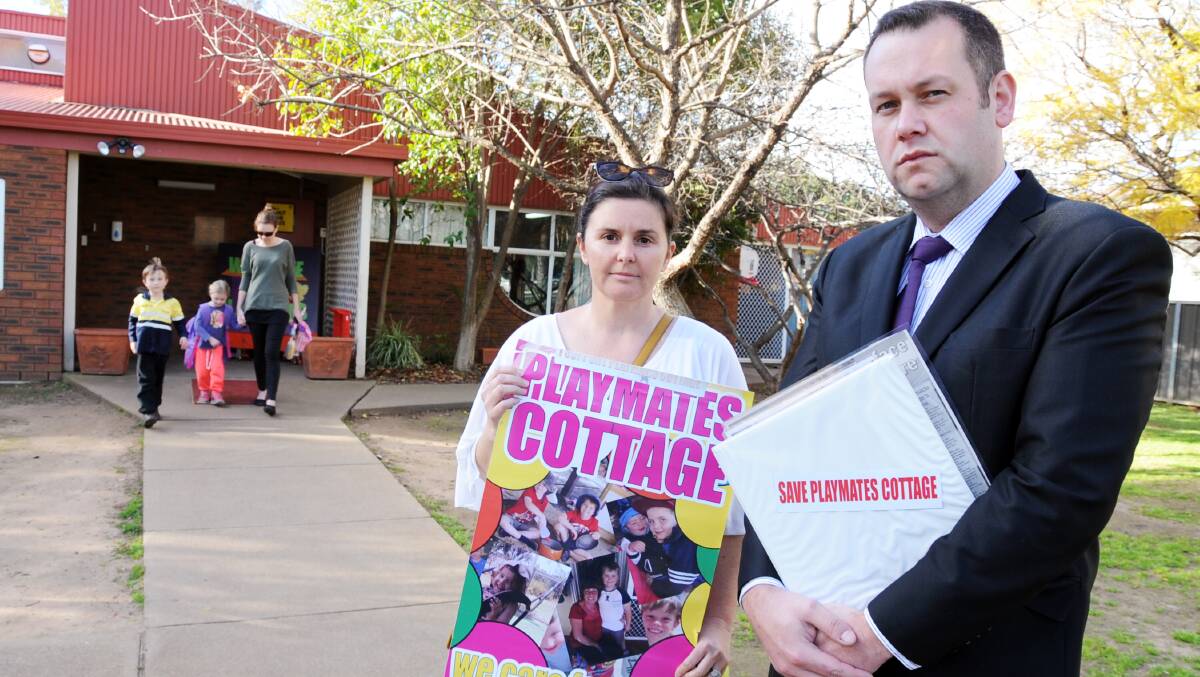 Save Playmates Cottage subcommittee chairwoman Virginia Morley and Dubbo City Councillor Ben Shields at the childcare centre yesterday after Dubbo City Council voted to make urgent representations to the state government about the centre's future. Photo: BELINDA SOOLE