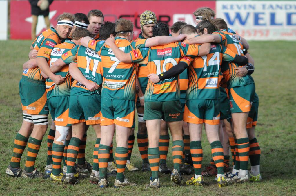 MAKING HISTORY: Orange City huddles up before its 113-point win over Mudgee on Saturday. The victory is the largest Blowes Clothing Cup win of the last decade. 
Photo: STEVE GOSCH 0719sgrugby1