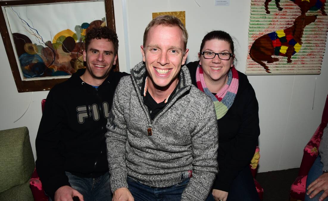 BACK AGAIN: Phil Sweeny, Drew Walton and Jess Sweeney were among 60 or 70 people who attended the relaunch of Midnite Cafe in July. Photo: BROOK KELLEHEAR-SMITH