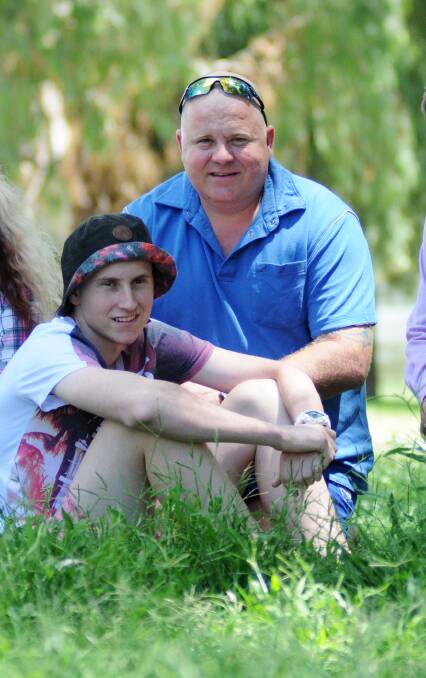 HE WILL BE MISSED: Kailem Barwick with his dad Tony Barwick early last year, shortly after he was diagnosed with Ewing's sarcoma. Photo: BELINDA SOOLE