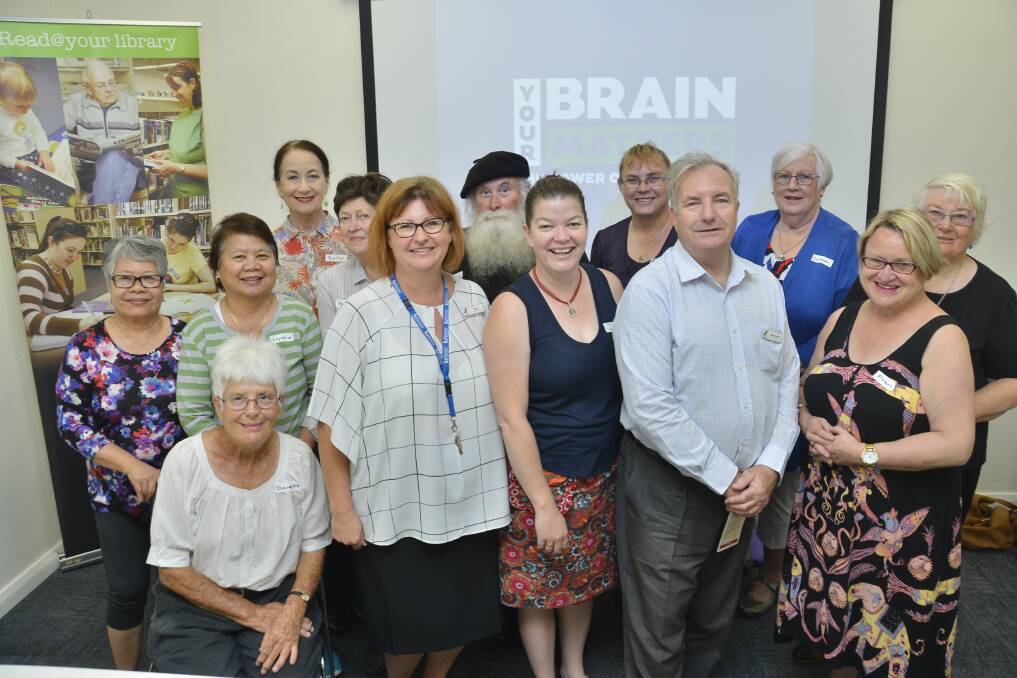 TRAIN THAT BRAIN: Fiona Dunn, Jenny Roberts and John Bayliss, surrounded by the participants of the first 'Your Brain Matters'. Photo: PAIGE WILLIAMS