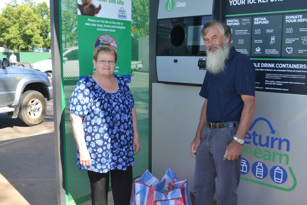 POPULAR: Dubbo residents Cathy and Reg Tripp were among those using the reverse vending machine on Friday morning. Photo: ELIZA FESSEY