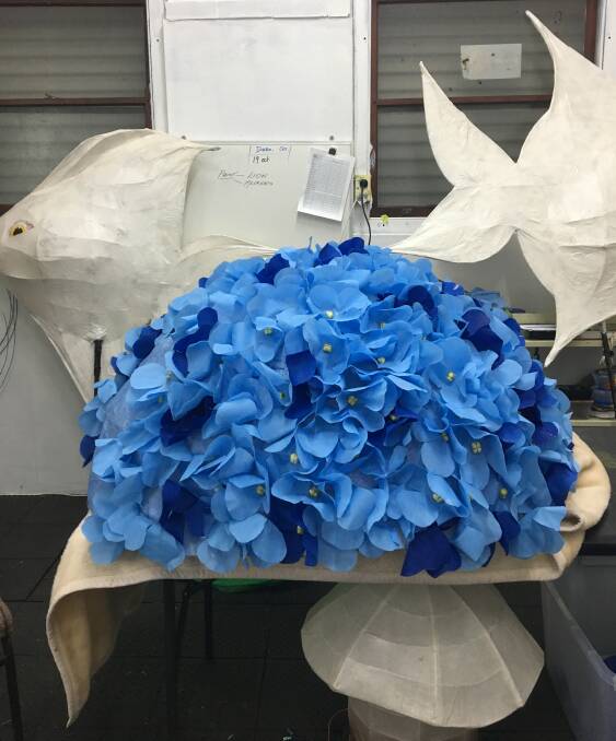 CITIES REPRESENTED: More than 600 individual florets have been added to the hydrangea lantern which will be in the DREAM lantern parade. Photo: CONTRIBUTED 