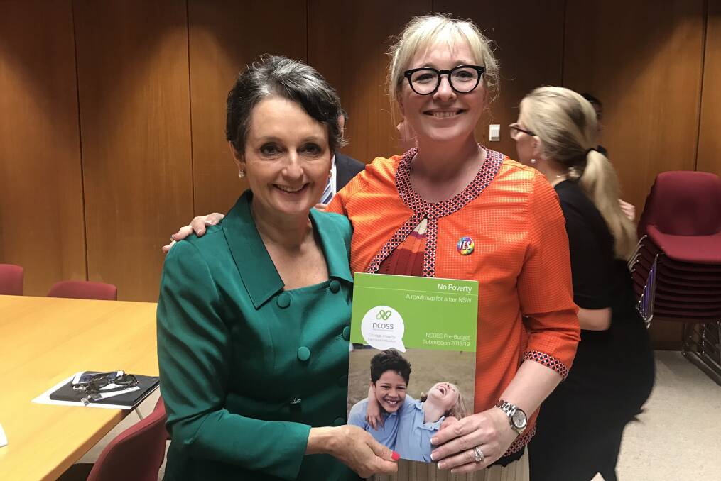 NCOSS CEO Tracy McLeod Howe (left) presenting the organisation's budget submission, which calls for more help for children, to Minister for Family and Community Services Pru Goward. Photo: Tracy McLeod Howe twitter