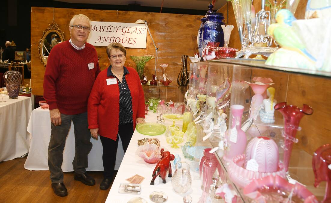 UNIQUE ITEMS: Stephen and Margaret Illman travelled from Adelaide to show their glass wares at the Dubbo Antiques and Collectables Fair. Photo: AMY McINTYRE