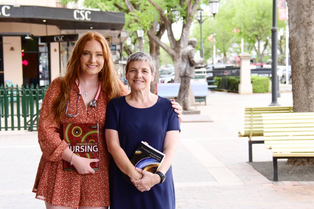 SUPPORT: Grace Appleby and her aunty Lanie Kilsby will graduate from Charles Sturt University Dubbo together. Photo: AMY McINTYRE