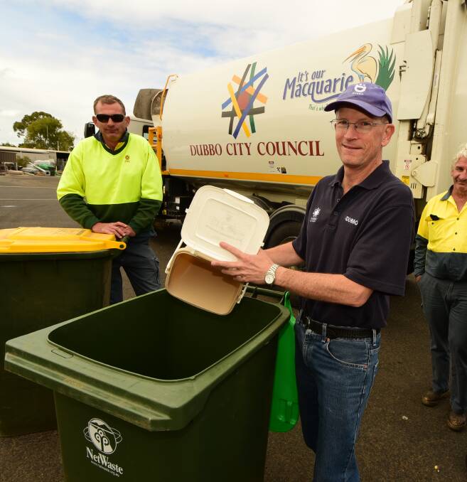 LONG DEBATE: Dubbo council started informing the public about the green bins in 2015. Pictured are council's Scott Neyland, Steve Clayton and David Pipe. Photo: BELINDA SOOLE