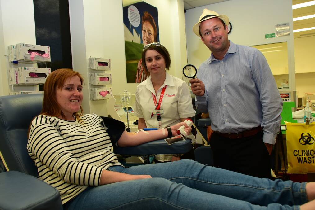 ROLL UP YOUR SLEEVES: Student Lucy Hawkins has taken part in the Red Cross Blood Service's Hunt for Red in October alongside Mary Meadow and Brian Bruce. Photo: PAIGE WILLIAMS