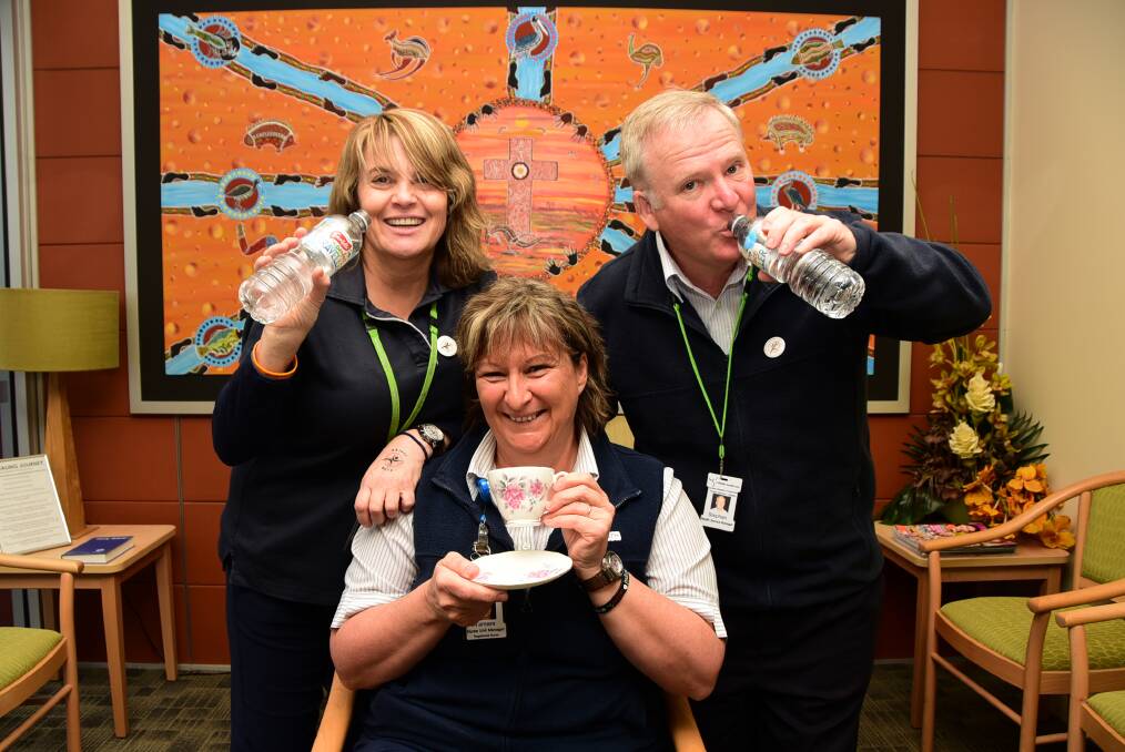 DOING IT FOR CHARITY: Janelle Vandermaal, Tamara Hollman and Steve Evans will be sticking to the water and tea this month as participants in Dry July. Photo: Belinda Soole