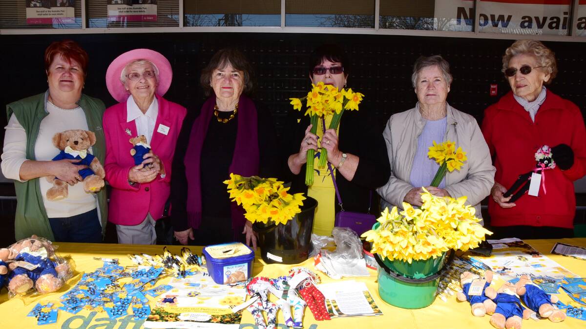 LENDING A HAND: Members of the Dubbo Cancer Support Group selling Daffodil Day merchandise on Talbragar Street last year. Photo: BELINDA SOOLE