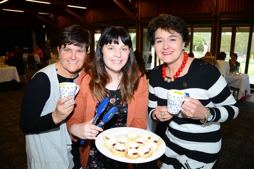 GET EATING: Trish Taylor, Brianna Carracher and Melanie Trethowan at last year's Biggest Morning Tea at the zoo, which raised money for the Cancer Council. Photo: BELINDA SOOLE