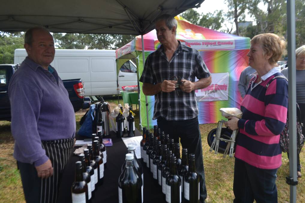 Mick Banks from Bell River wines chats with some visitors to one of the previous markets. Photo: FILE