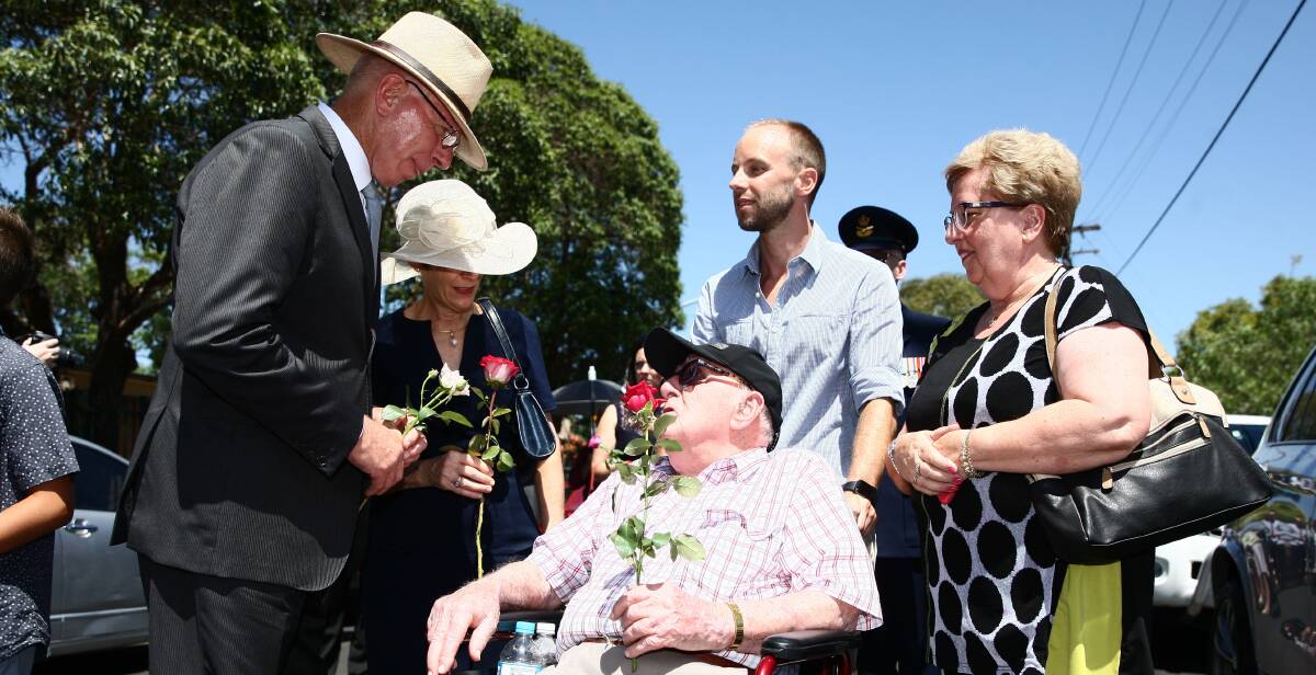 Special moment: Alexander Pederson, 103, lost his son Bruce in Australia's worst rail disaster 40 years ago. He led the walk from the church to the Bold Street Bridge.