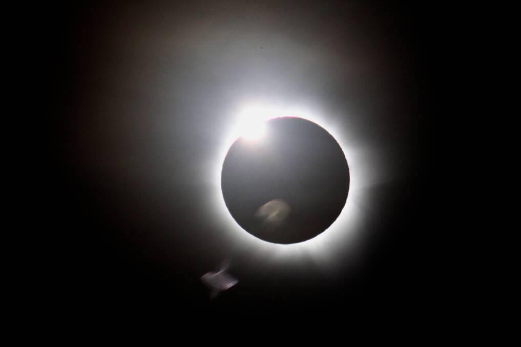 How the solar eclipse appeared at Palm Cove, near Cairns early yesterday ((Wed)) morning. Photo: Peter Rae.