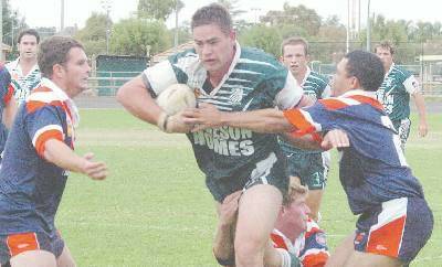 CYMS prop Nathan Lawrence powers into the Cobar defence during yesterday’s Group 11 match at No 1 Oval.