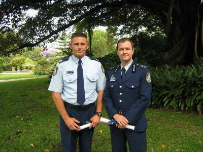 Sergeant Paul Williamson and Superintendent Michael Willing after receiving their awards yesterday.