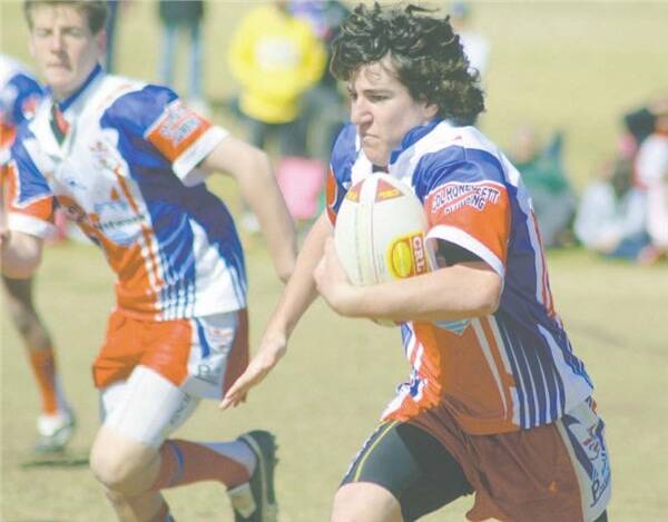 PCYC’s Daniel McDougall takes the ball forward in the under-13s major semi-final match against South Dubbo on Saturday. PCYC defeated the minor premiers South Dubbo 30-22 to be first into the September 6 grand final.