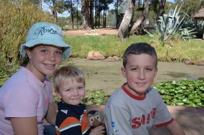 Taylah Wright, and William and Thomas Bullock  from Geelong were among some of the city’s Easter tourists and eagerly checked out Taronga Western Plains Zoo’s special Easter presents for the animals.