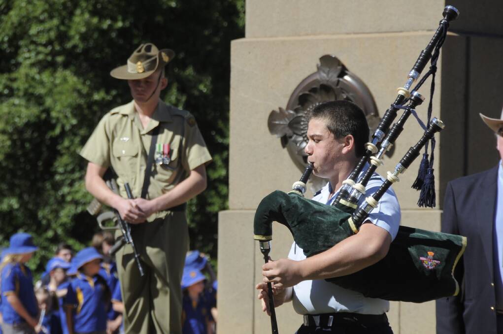 Gerdie Cato plays the pipies during the Anzac day service.