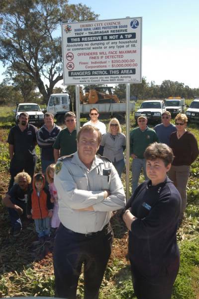 Concerned about rubbish dumping is Ranger Joe and Narelle Rodway (front) with  Les Verrall, Chris Seton, Graham Knight, Malcolm Murray, Nicole Seton, Kenny Kadwell, Ernie Boyd and Debbie Murray (behin