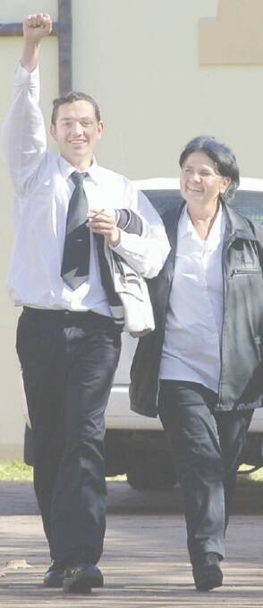 An elated Kevin Carr leaves court yesterday with his mother after having all charges against him dismissed.